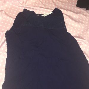 A shirt but a tank top I don’t really know